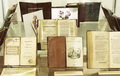 Книги из библиотеки И.И.Дмитриева на юбилейной выставке поэта Фрагмент экспозиции.