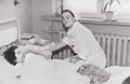 Е.В.Потемкина у постели больной. 1957