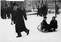 Папа катает Никиту на санках. Борисов сад, София. 1942